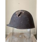 Каска шлем Vz.31 с боевыми повреждениями