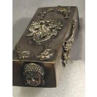 Шкатулка металлическая посеребрянная с  будистскими рельефами .