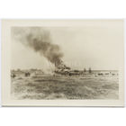 Немецкий обоз проходит мимо советского села и горящей хаты.