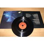 Dire Straits – Love Over Gold