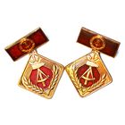 Два знака "Ударник социалистического труда в искусстве ГДР" в разном исполнении