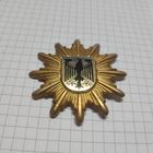 Кокарда на головной убор Федеральной полиции Германии.