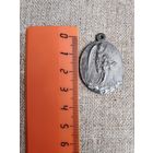 Старинный католический медальон.