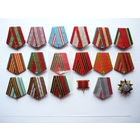 Колодки в сборе с лентами и промзвеньями к медалям. Разные. Идеального состояния. Все оригинальное! 17 колодок и 1 знак.