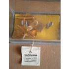 Запонки золоченые в упаковке с ценником.вставка из родонита.