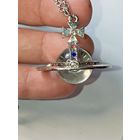 Маятник с кристаллом кварца  . Очень красивый .