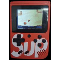 Портативная игра. С играми денди. Работает