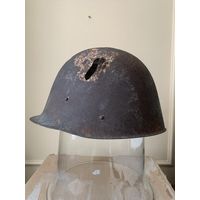 Каска шлем Vz.31 с боевыми повреждениями