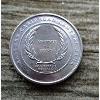 Werty71 Карибские острова 1 доллар 2008 Карибы 25 лет Восточно-Карибскому Центральному банку