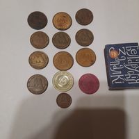 Жетоны метро: Минск, Киев, Санкт-Петербург, Москва.