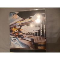ZON " BACK DOWN TO EARTH"  CD 1979