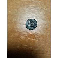 Монета полушка петра