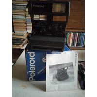 Фотоаппарат полароид в упаковке