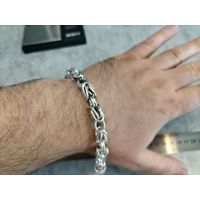 Браслет серебро 925, 51.8 грамм, длина 25 см, толщина 1 см.