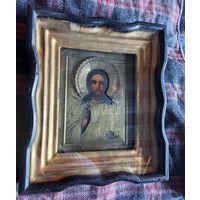 Икона в киоте под стеклом старая