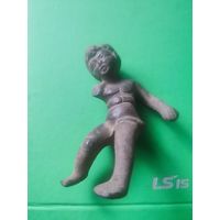 Старинная фигурка (фрагмент )