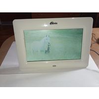 Цифровая фоторамка бренда Ritmix.