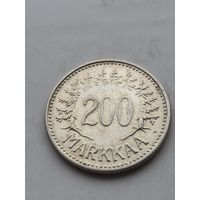 200 марок Финляндия 1956 года. Серебро 500. Монета не чищена, в блеске. 45358
