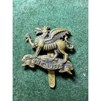 Латунный полковой значок Королевского восточнокентского полка, также известного как Баффы