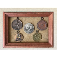 Боксерские медали прошлого века в рамке
