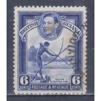 [1710] Британские колонии. Британская Гвиана 1938. Георг VI.Индеец с луком. Гашеная марка.