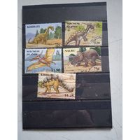 Марки океании динозавры**