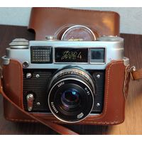 Советский дальномерный фотоаппарат ФЭД-4 объектив Индустар-61 с фокусным расстоянием 52мм и диафрагмой 2.8 . в родной коробке и чехле из натуральной кожи