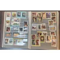 Альбом с почтовыми марками  разными  марками  .
