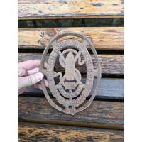 Эмблема швейной машины Сингер