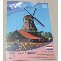 Посткроссинг. Открытка из Нидерландов: мельница  (10х15). Прошла почту. Стандартная марка, чёткий штемпель.