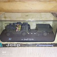 Джип с прицепом.В боксе"Карарама."1/43.