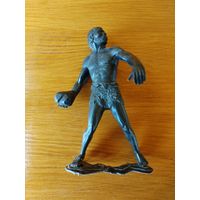 Фигурка первобытного человека.