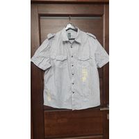 Стильная рубашка на 50-52 размер, хлопок, отличное состояние. Длина 73 см, ПОгруди 57 см, прямого фасона. Классная и легкая. Нежно-лилового цвета.