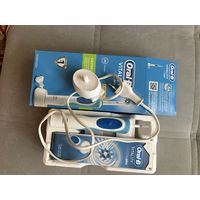 Электрическая зубная щетка.