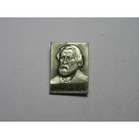 Значок с изображением русского писателя Ивана Сергеевича Тургенева.