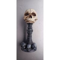 Подсвечник череп