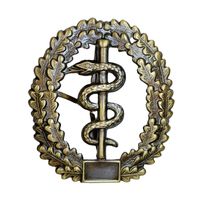 Бундесвер (Вооруженные силы Германии) Металлическая кокарда на берет - МЕДИЦИНСКАЯ СЛУЖБА 5,4 \ 4,6 см. Дефект заколки