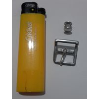 Пряжка и шпенек подбородочного ремня нем. каски. Перевыставление.