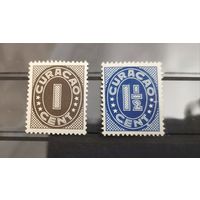 Кюрасао.Почтовые марки с цифрами 1936-1942 гг.