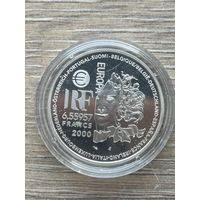 Французская монета номиналом 6,55957 франков 2000 года выпуска