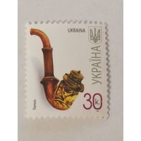 Марка из седьмого стандартного выпуска 2008 года - Курительная трубка