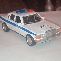Машинки в коллекцию Мерседес 123 полиция