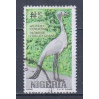 [1130] Нигерия 1993. Фауна.Птицы.Журавль. Гашеная марка.