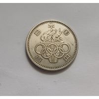 100 йен 1964 г. (39 год Сёва),600пр., Олимпиада в Токио.Не чищена.