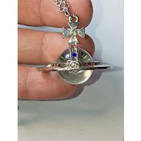 Маятник с кристаллом кварца  . Очень красивый .